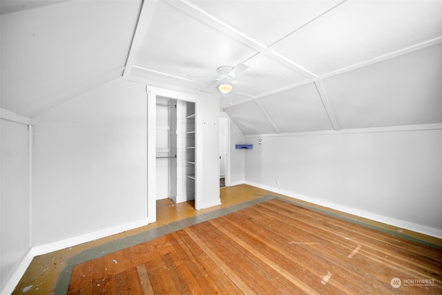 bonus room featuring hardwood / wood-style floors, ceiling fan, and lofted ceiling