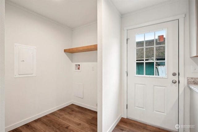 entryway with electric panel, hardwood / wood-style floors, and ornamental molding