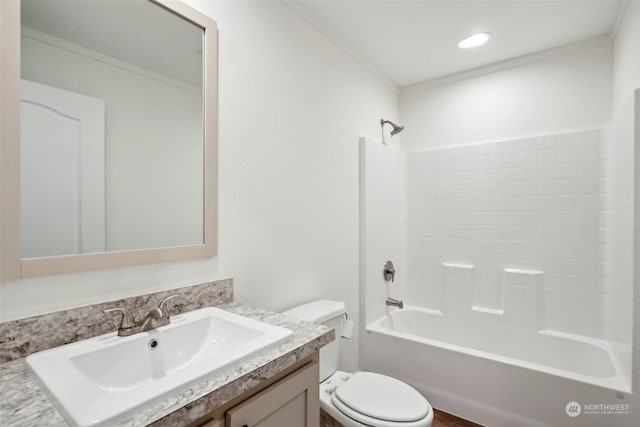 full bathroom featuring vanity, toilet, shower / bathing tub combination, and ornamental molding