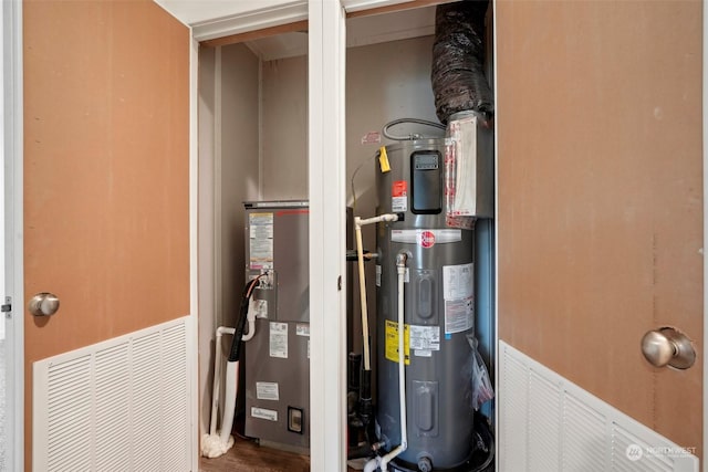 utility room with heat pump water heater