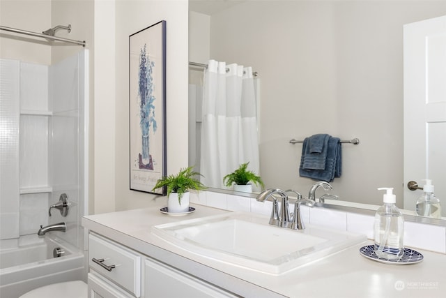 bathroom with vanity and shower / tub combo