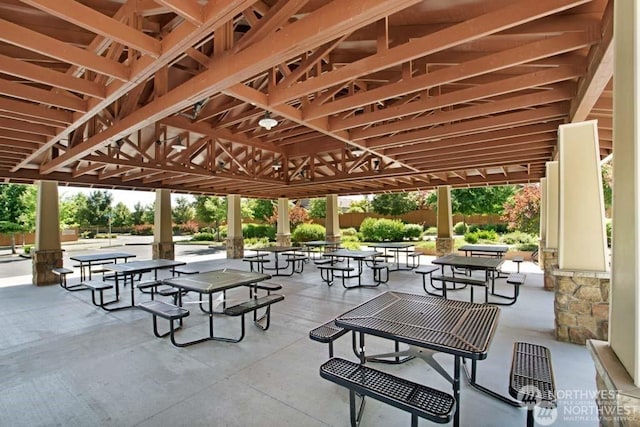 surrounding community featuring a patio