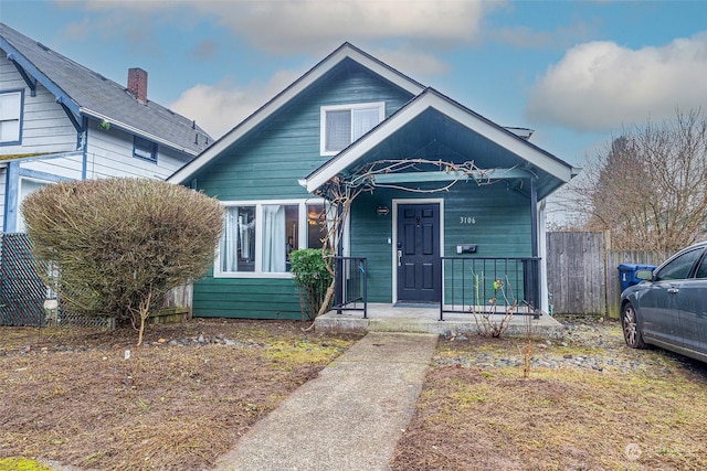 bungalow-style home featuring covered porch