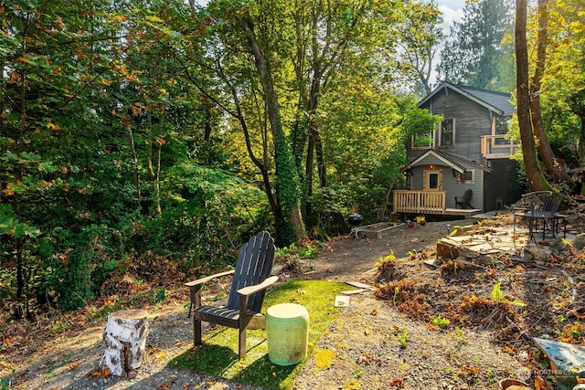 view of yard featuring a deck