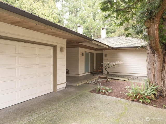 exterior space with a garage