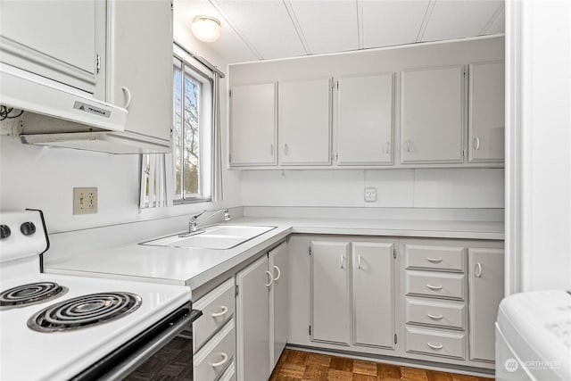 kitchen featuring electric stove, sink, dark parquet floors, and gray cabinetry