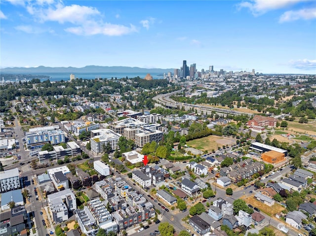 birds eye view of property with a mountain view