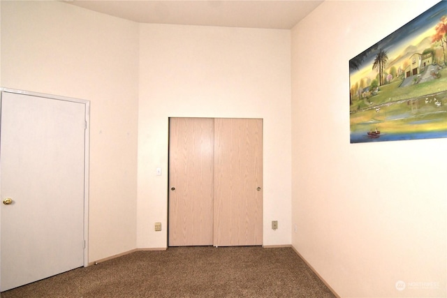 unfurnished bedroom with carpet flooring