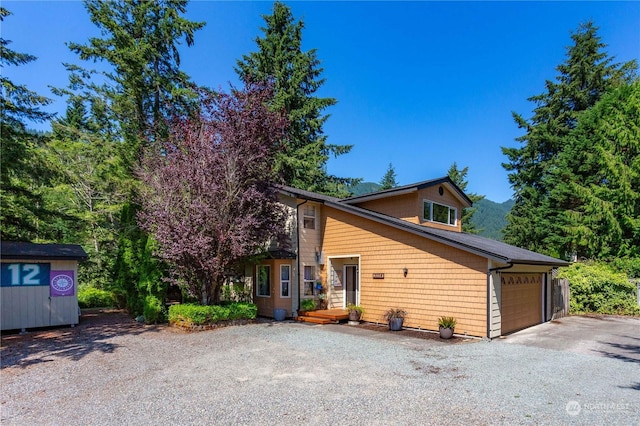 view of property exterior featuring a garage