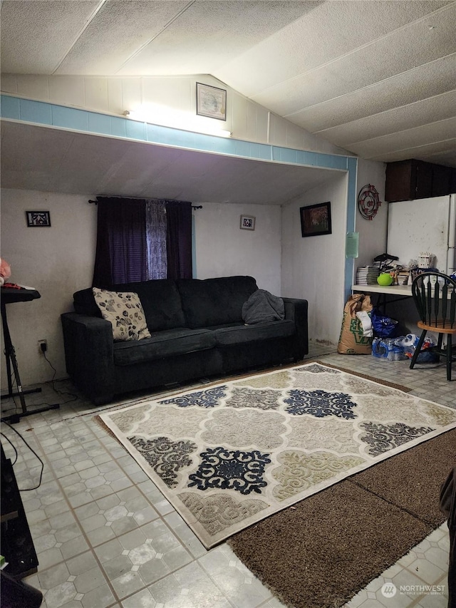 living room with lofted ceiling