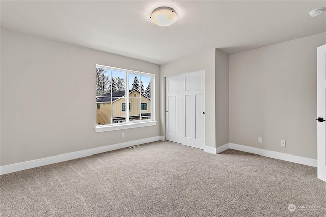 empty room with carpet floors