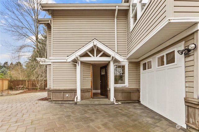 property entrance with a patio area