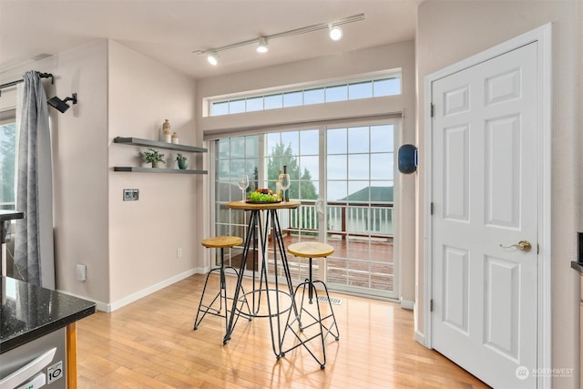 dining room featuring light hardwood / wood-style floors