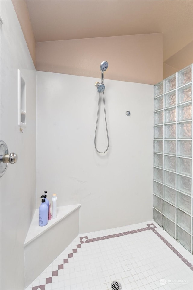 bathroom featuring walk in shower