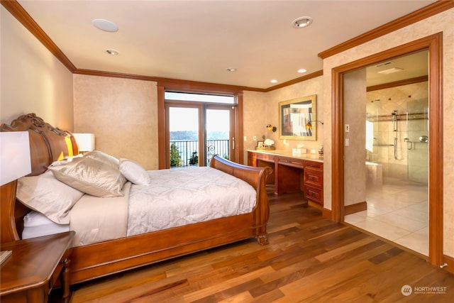 bedroom with access to exterior, hardwood / wood-style floors, and crown molding