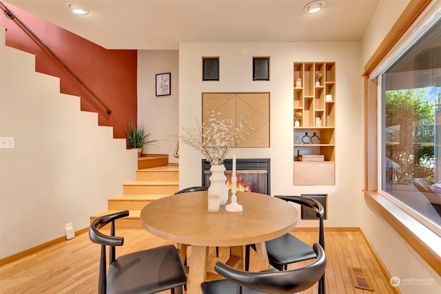 dining room featuring light hardwood / wood-style flooring