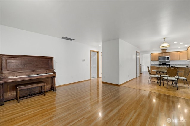 living room featuring light wood-type flooring