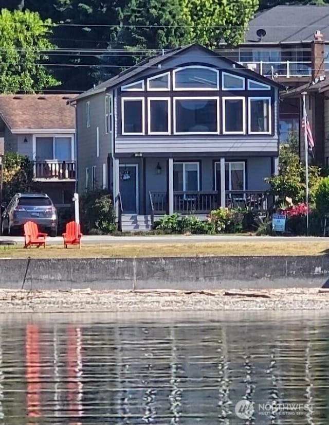74 E Utsalady Rd, Camano Island, WA 98282 - view of front of house featuring a water view