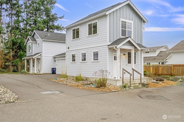 front of property with a garage