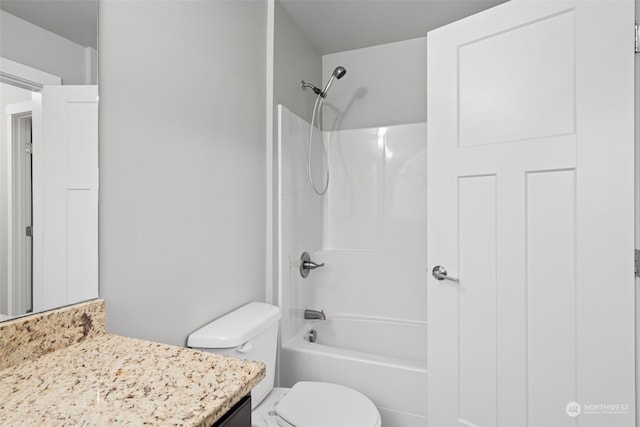 full bathroom featuring shower / washtub combination, vanity, and toilet