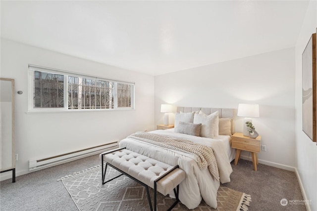 carpeted bedroom featuring baseboard heating