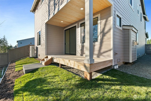 view of side of home featuring a yard