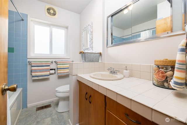 full bathroom featuring vanity,  shower combination, and toilet