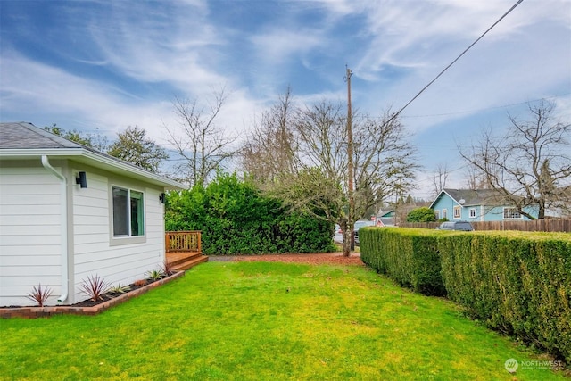 view of yard with a deck