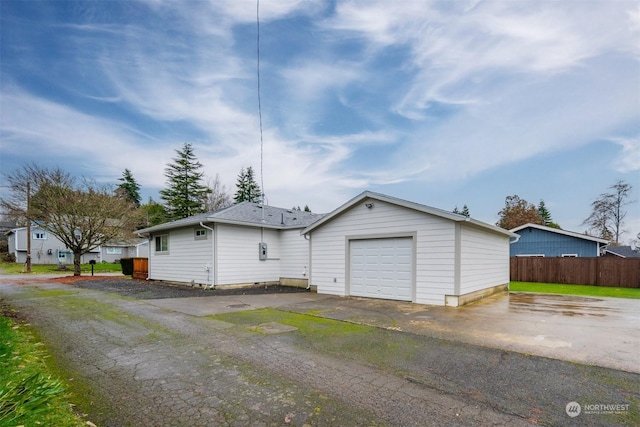 view of home's exterior with a garage