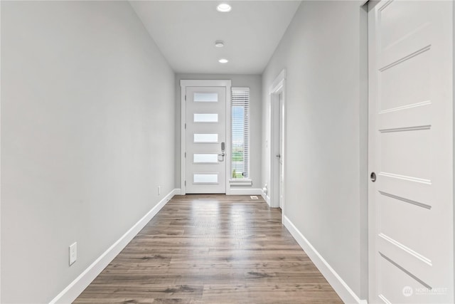 doorway featuring dark wood-type flooring