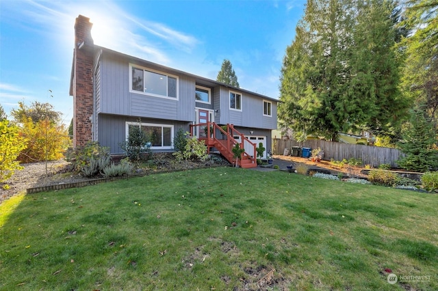 exterior space with a lawn and a garage