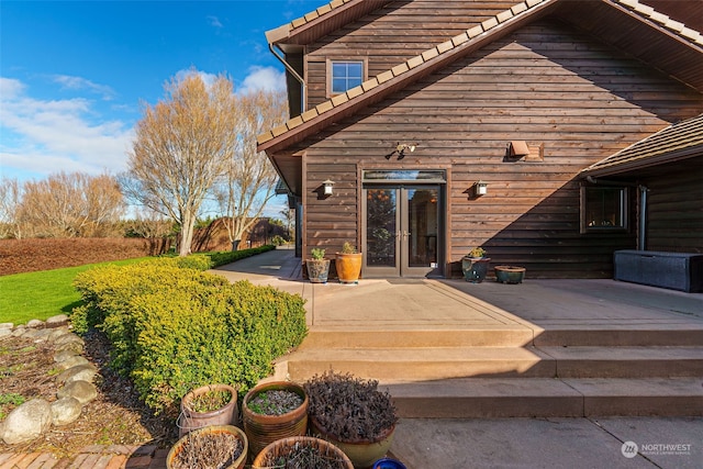 back of property with a patio area