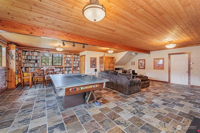 game room with wood ceiling and rail lighting