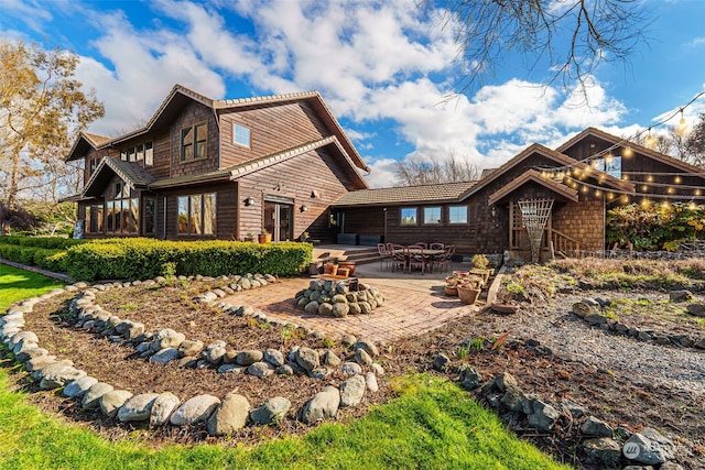 rear view of property with a patio