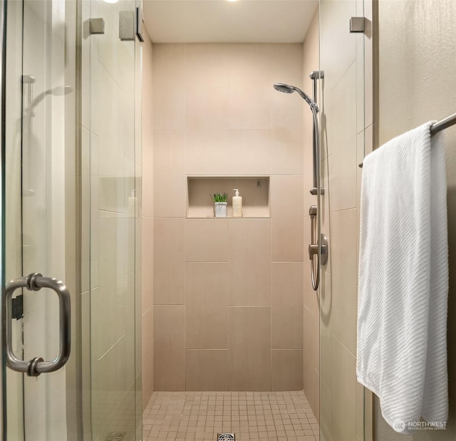 bathroom featuring walk in shower