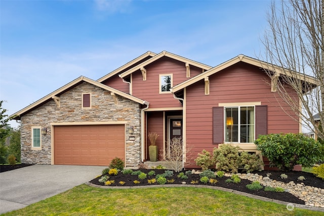 craftsman inspired home featuring a garage and a front yard