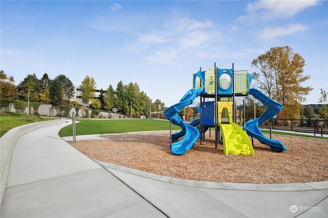 view of play area featuring a lawn