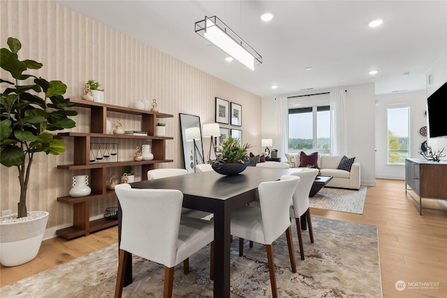 dining space featuring light hardwood / wood-style floors