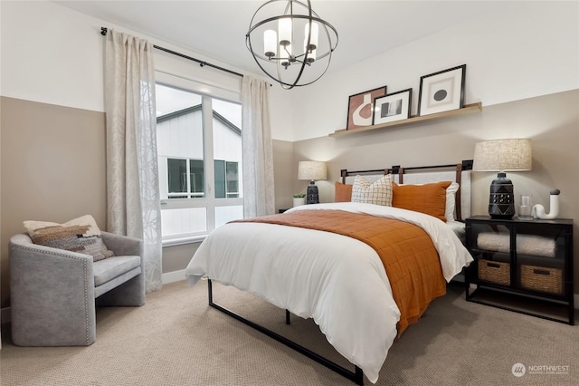 bedroom featuring light carpet, multiple windows, and a notable chandelier