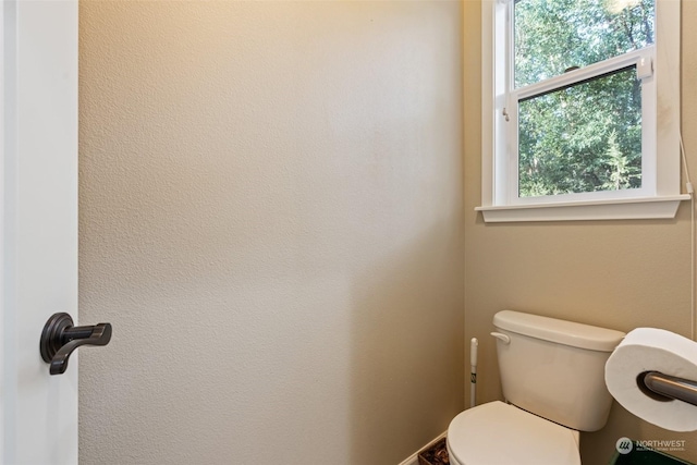 bathroom featuring toilet