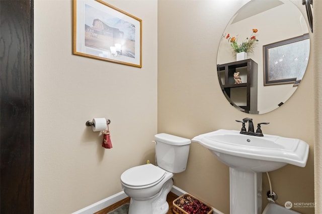 bathroom featuring toilet