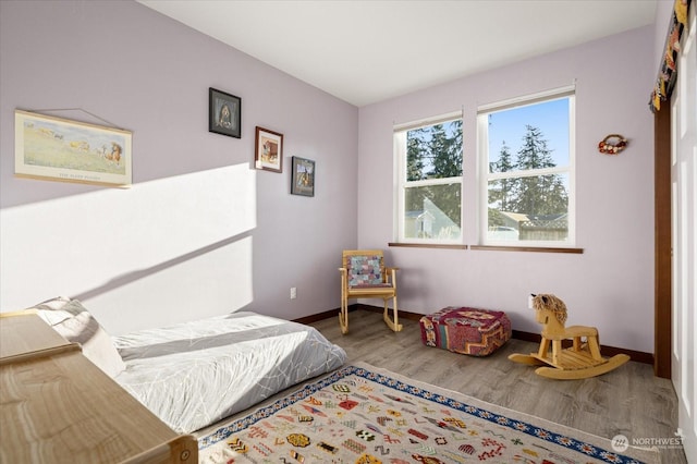 bedroom featuring hardwood / wood-style flooring