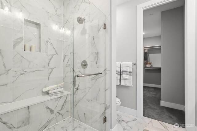 12327 137th Pl NE Unit 3102, Redmond, WA 98052 - bathroom with radiator heating unit, a shower with door, and toilet
