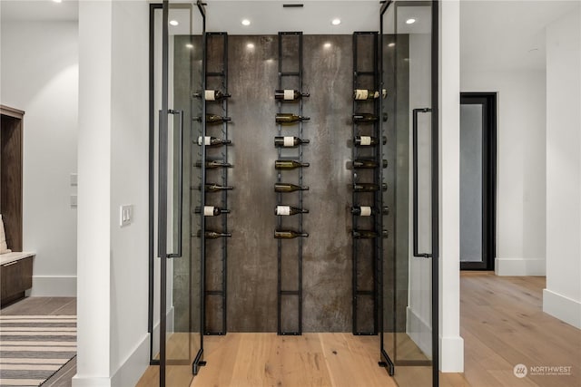 wine room featuring light hardwood / wood-style floors