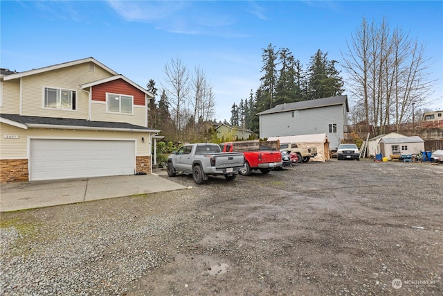 exterior space with a garage