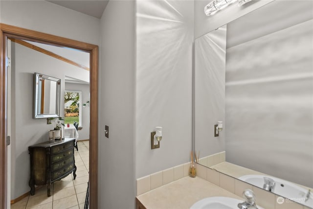 bathroom with tile patterned flooring and vanity