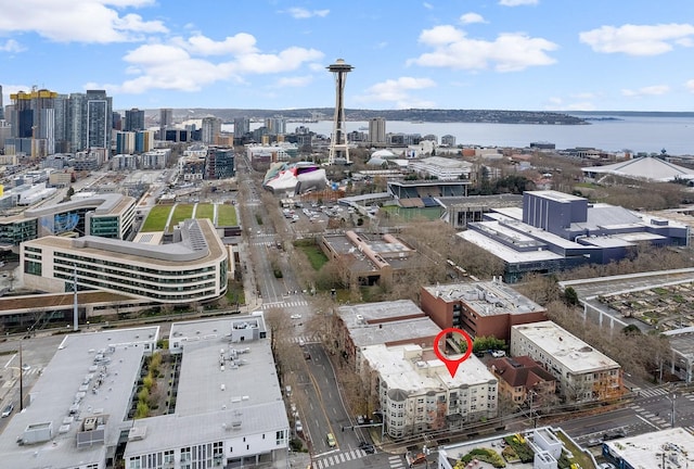 birds eye view of property with a water view