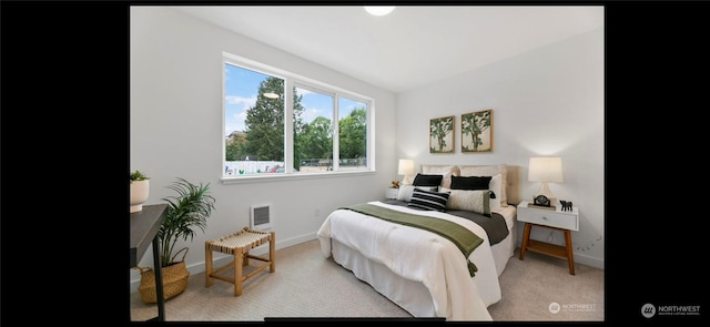 bedroom with light carpet