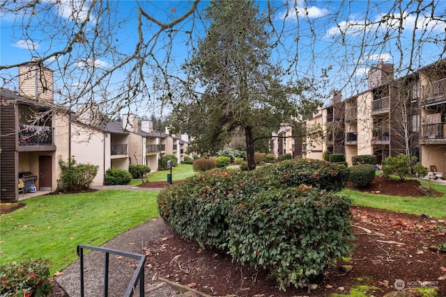 view of community with a yard