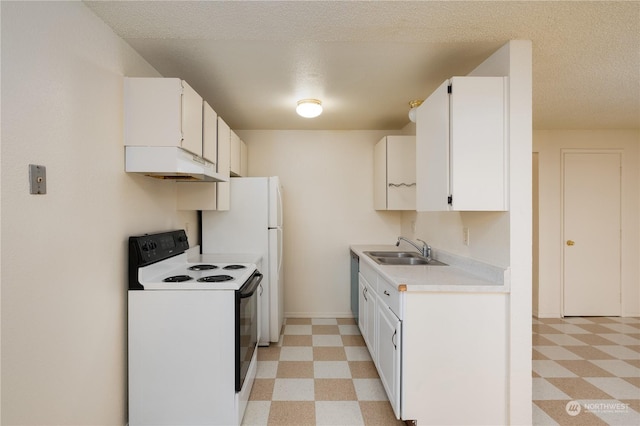 kitchen with sink, range with electric cooktop, white cabinets, and white fridge